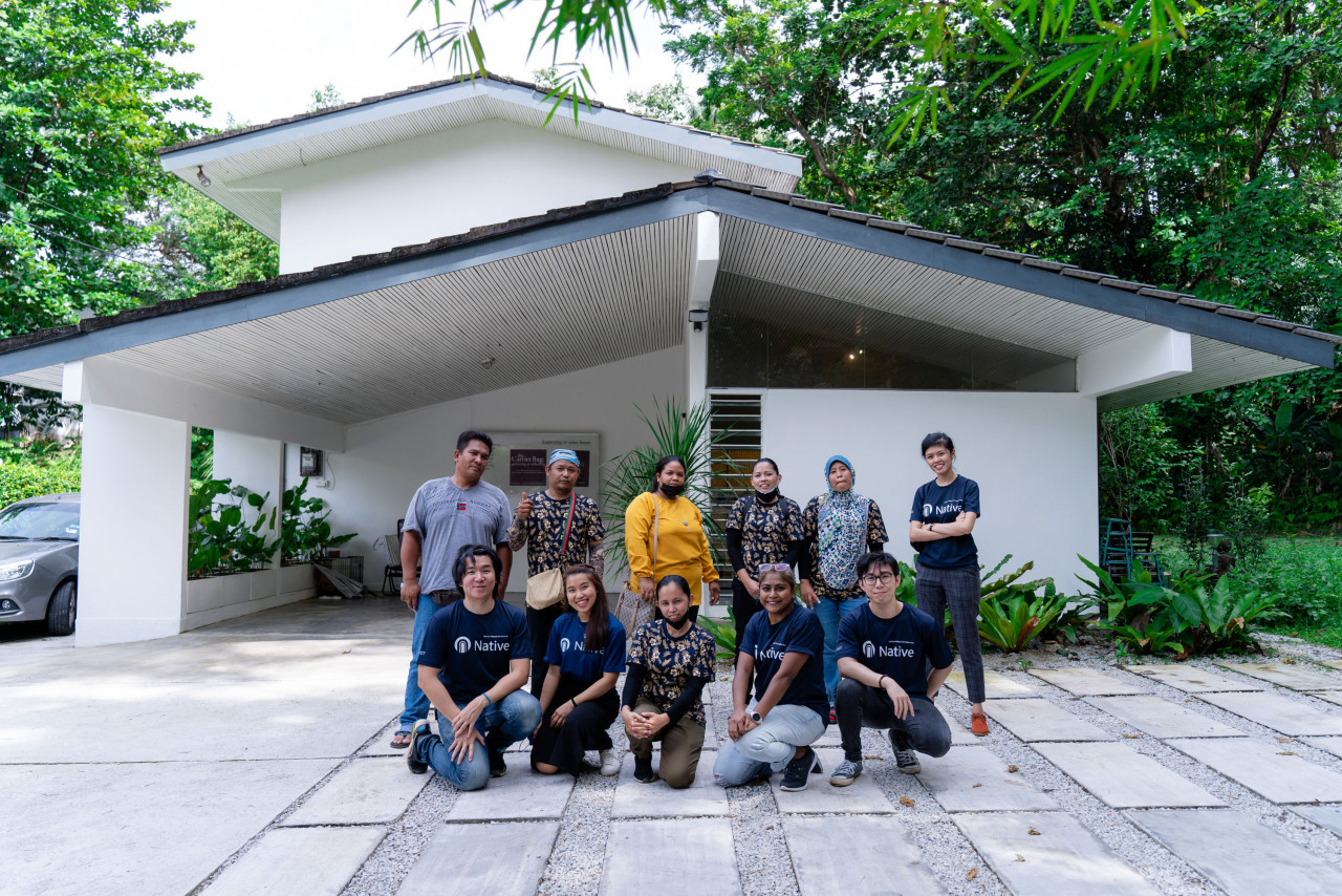 The staff of Native Discovery and Orang Asli cooks bid a fond farewell after a satisfying meal. – Pic courtesy of Native Discovery