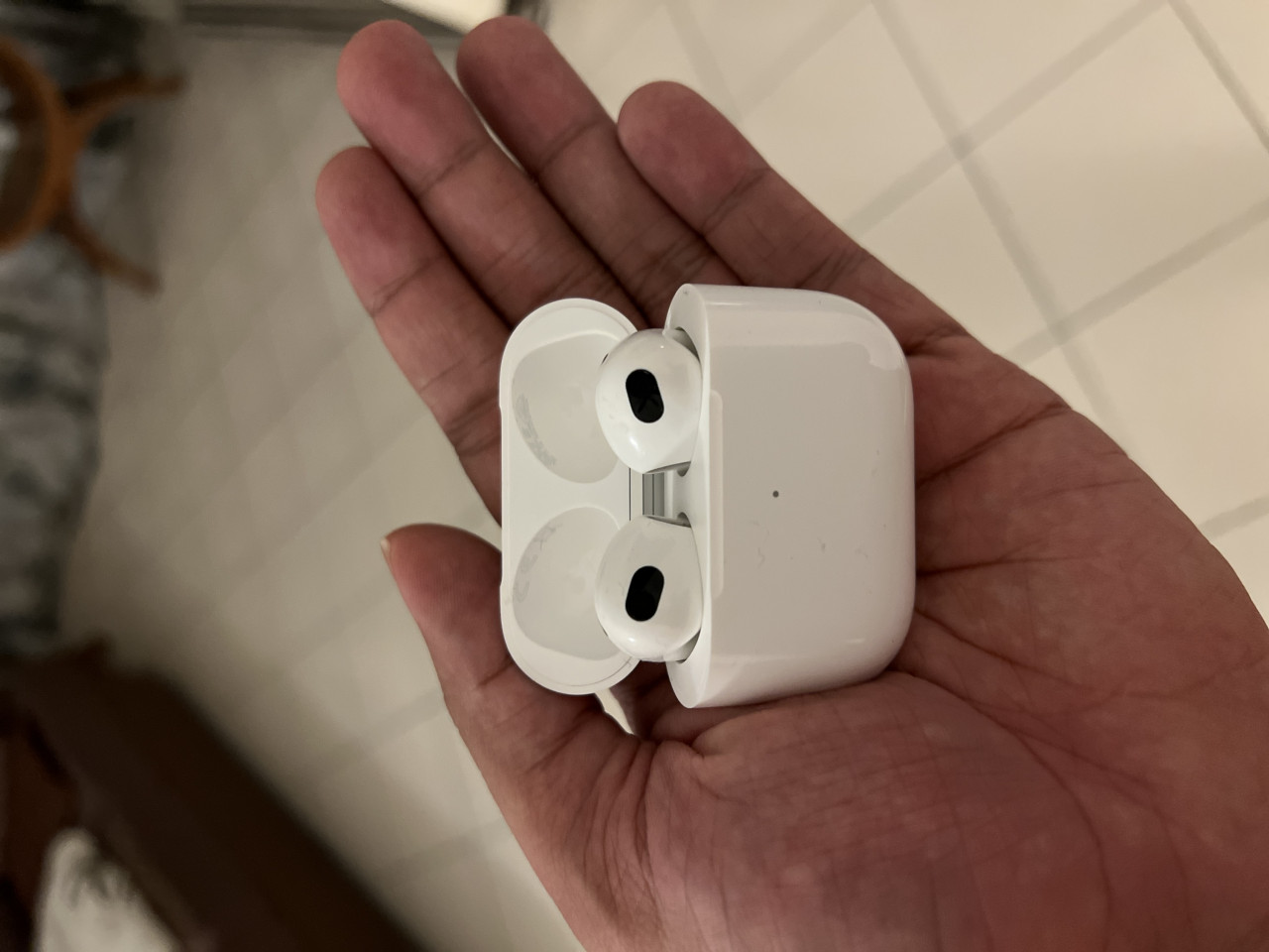 The AirPods case easily fits in the palm and is altogether quite flexible. – Haikal Fernandez pic