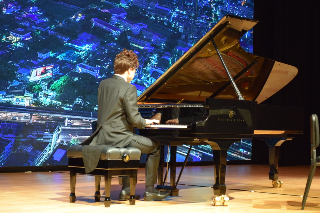 Poom playing the Steinway grand piano. – Pic courtesy of Fairview