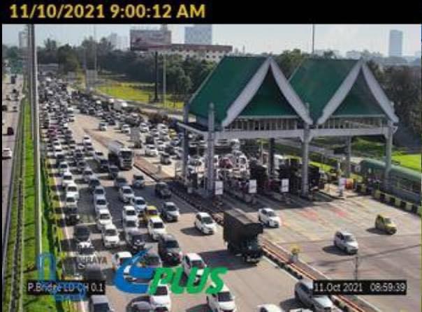 Heavy traffic at the PLUS toll plaza towards the Penang bridge. – PLUS pic