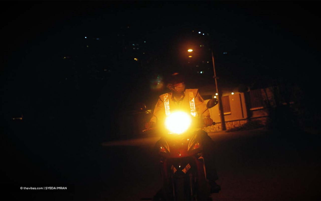 Uncle Selva at his guard booth. His shift starts at 9pm and ends at 7am. – SYEDA IMRAN/The Vibes pic