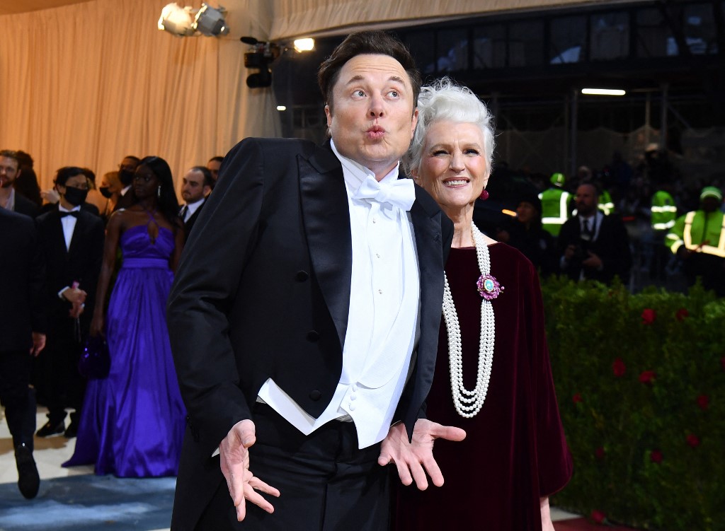CEO and chief engineer at SpaceX, Elon Musk, and his mother, supermodel Maye Musk. – AFP pic