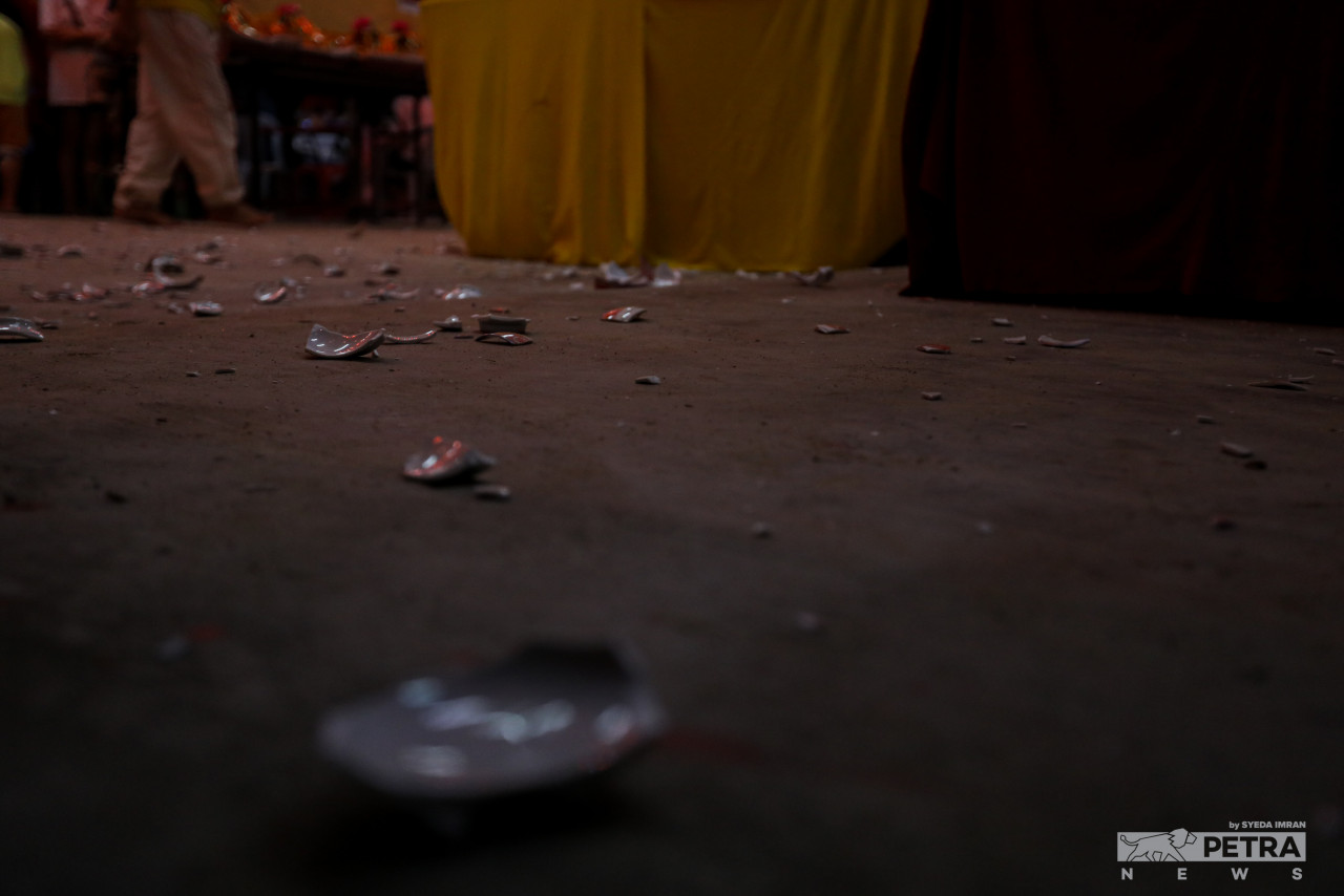 Bowls seen scattered on the floor after the fate (destiny) change ceremony. – SYEDA IMRAN/The Vibes pic