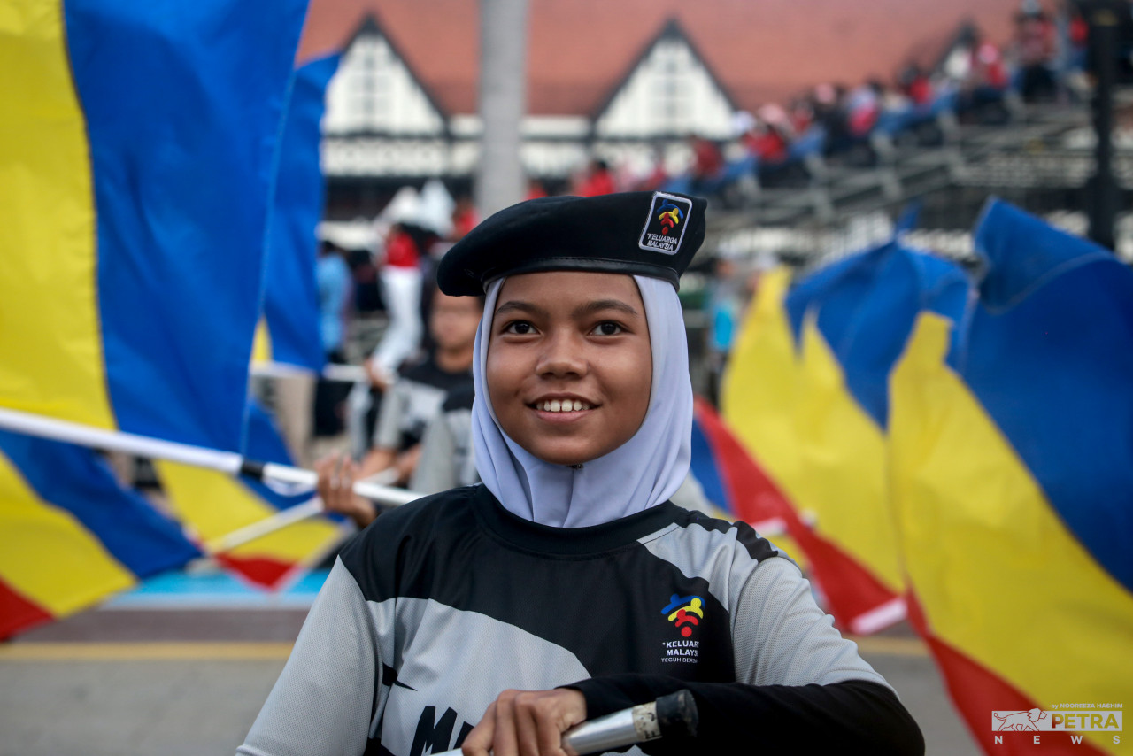 Participants were in a jubilant mood during the final full dress rehearsal for the 2022 National Day parade yesterday. – NOOREEZA HASHIM/The Vibes pic, August 30, 2022