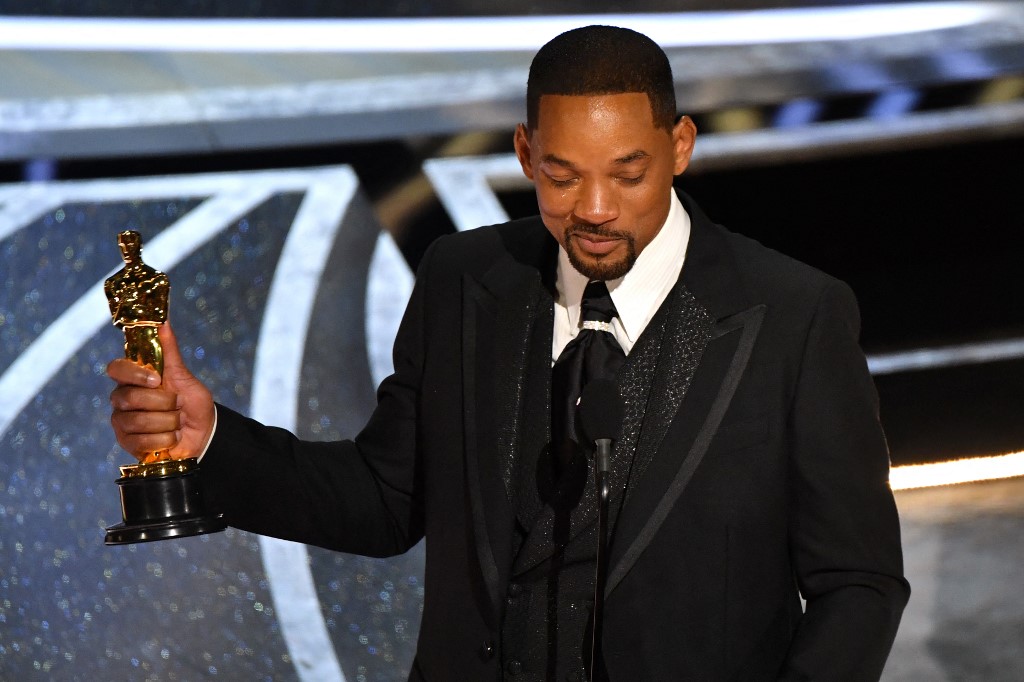 Will Smith accepting the award for Best Actor in a Leading Role for 'King Richard' onstage. – AFP pic