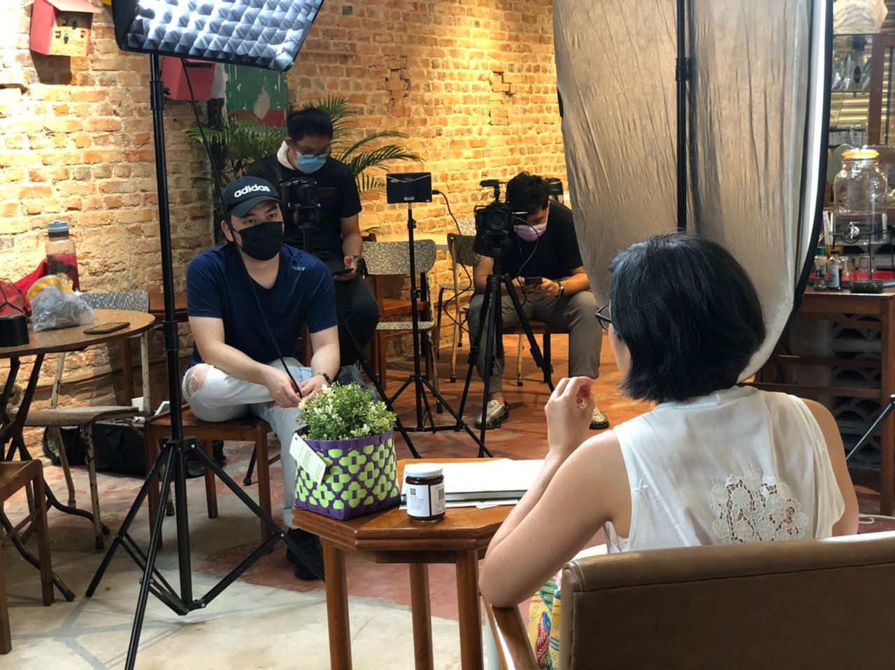 Illimate Creative creative director and Melaka-born Alex Loh pictured behind the scenes interviewing for his documentary. – Pic courtesy of Illimite Creative/Alex Loh