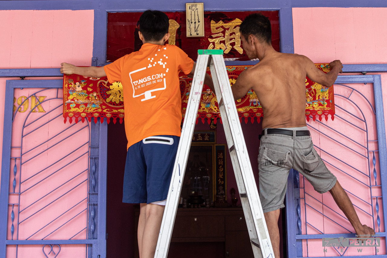 Residents of Pulau Ketam, a fishing village that was founded circa 1880, decorate their homes to celebrate Chinese New Year. – SAIRIEN NAFIS/The Vibes pic, January 31, 2022