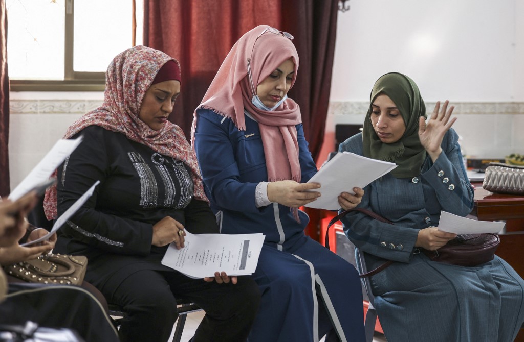 Actresses on set during the filming of 'Qabdat al-Ahrar'. – AFP pic