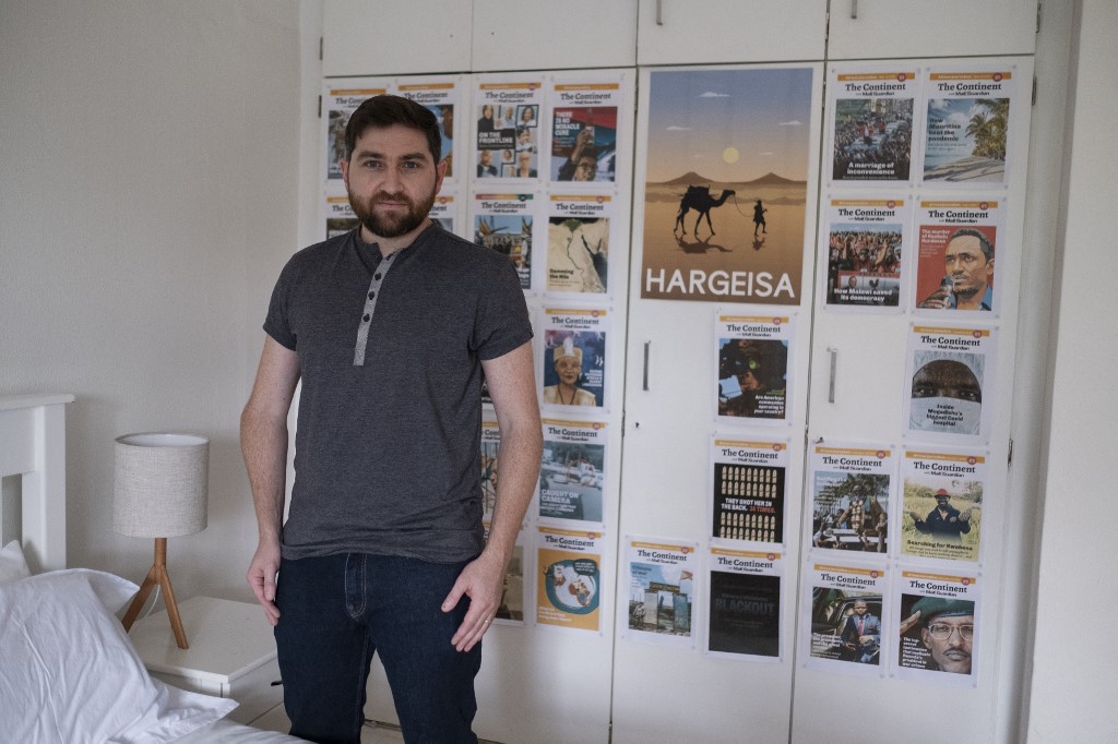 Simon Allison, editor of the South African newspaper 'The Continent', in his guest room that he uses as an office, in his house, in Johannesburg, South Africa, on December 15, 2021. – AFP pic