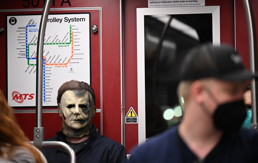 A cosplayer dressed as Michael Myers from the movies 'Halloween' riding the trolley during Comic-Con International 2022 on July 21, 2022 in San Diego, California. – AFP pic