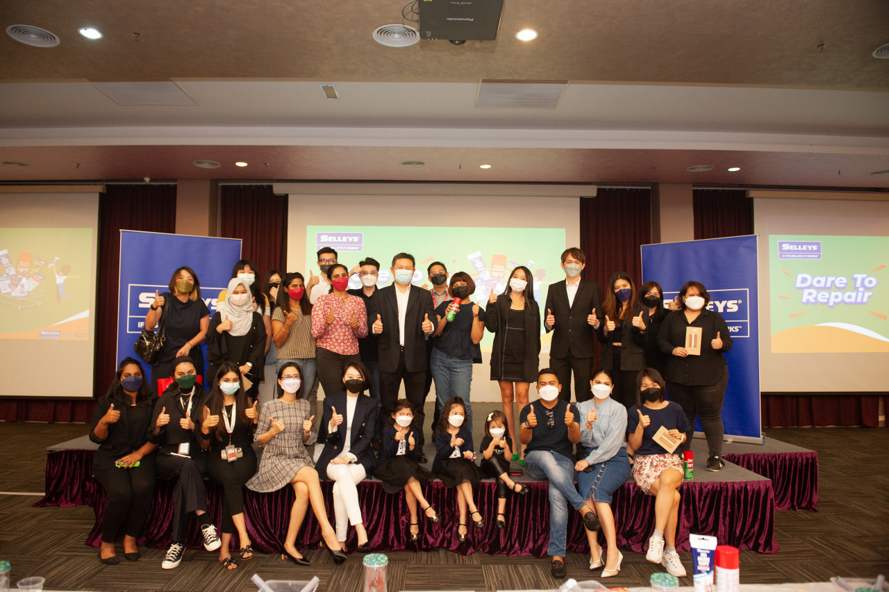 Nippon Paint Malaysia (Group Trade User Business) general manager Chen Lee Sion (centre) on stage with participants of the recent #DareToRepair workshop. – Pic courtesy of Nippon Paint Malaysia