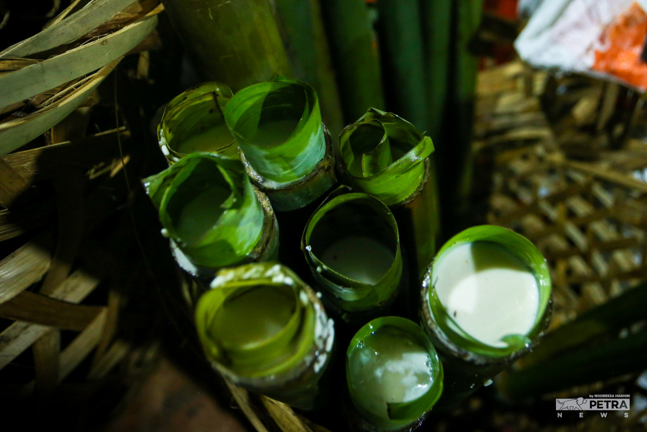 Coconut milk is one of the main ingredients for preparing lemang. – NOOREEZA HASHIM/The Vibes pic, May 9, 2022
