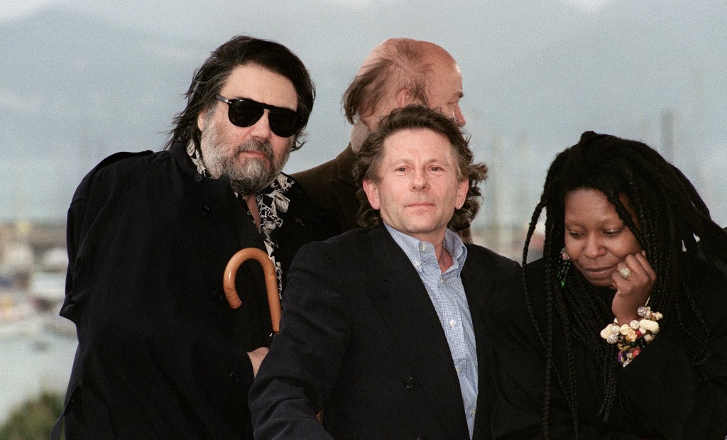 French filmmaker of Polish origin Roman Polanski (centre) during the 44th Cannes Film Festival when he was president of the jury, next to some members of the jury, Greek musician Vangelis (left), US actress Whoopi Goldberg (right) and French film director Jean-Paul Rappeneau (centre, above) on May 8, 1991. – AFP file pic