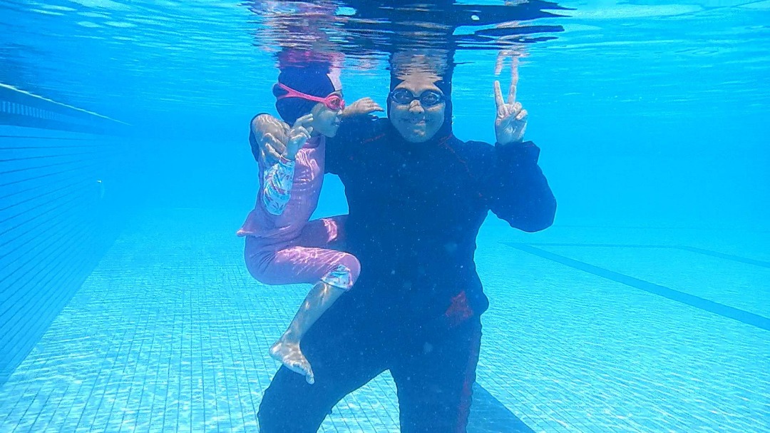 Nik Didi learning to swim at 34 to be able to join her girls. – Pic courtesy of Nik Didi Nik Mohd Yusoff