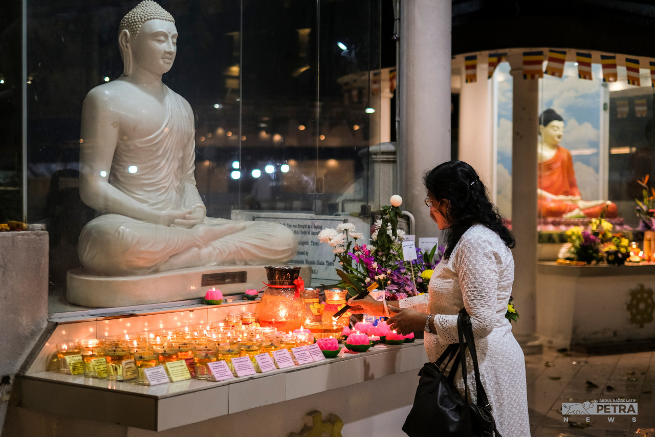 Some of the good practice observed is the presentation of food or alms to monks or the release of captive animals. – ABDUL RAZAK LATIF/The Vibes pic