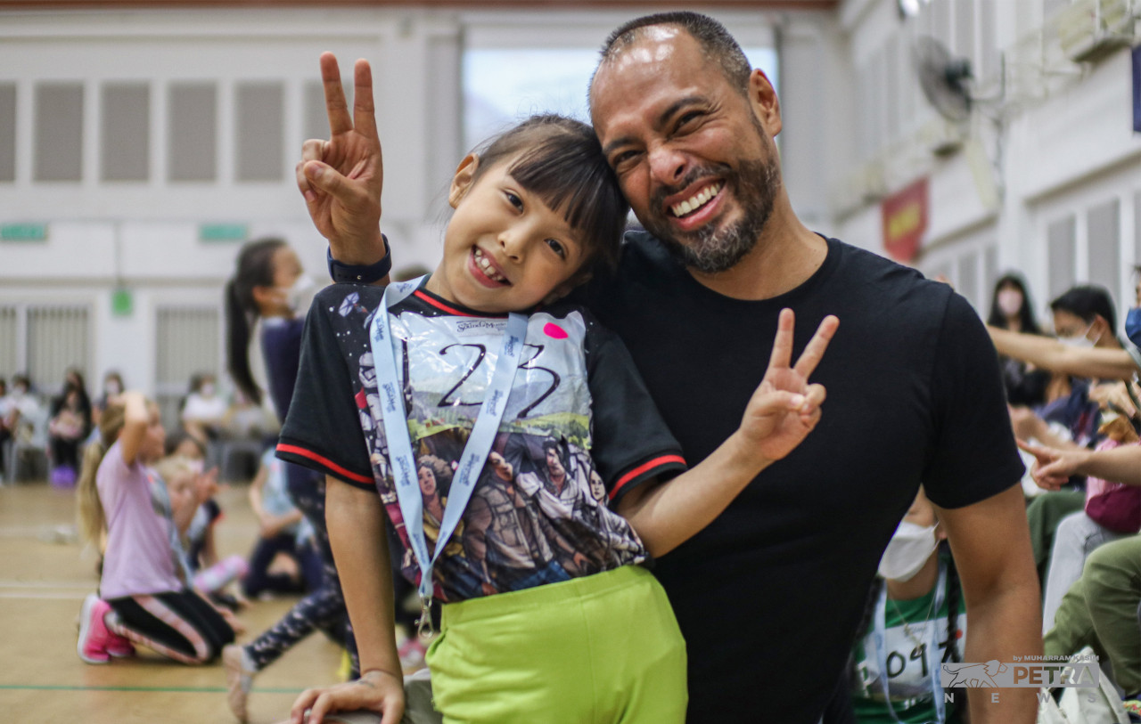 Tony Estrella accompanying his seven-year-old daughter Catelya Chan de Estrella who is half Malaysian for the auditions. He shared that his family embraces music whole-heartedly with Catelya’s mother also not a stranger to the scene, being an opera singer. – MUHARRAM KASIM/The Vibes pic