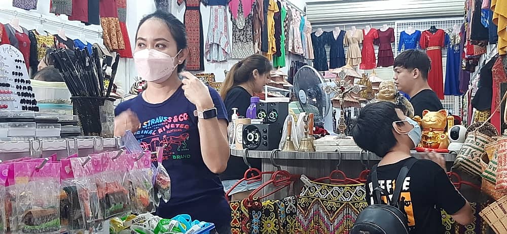 A customer in search of costumes and accessories to wear for Gawai. – Pic by Marilyn Madrod