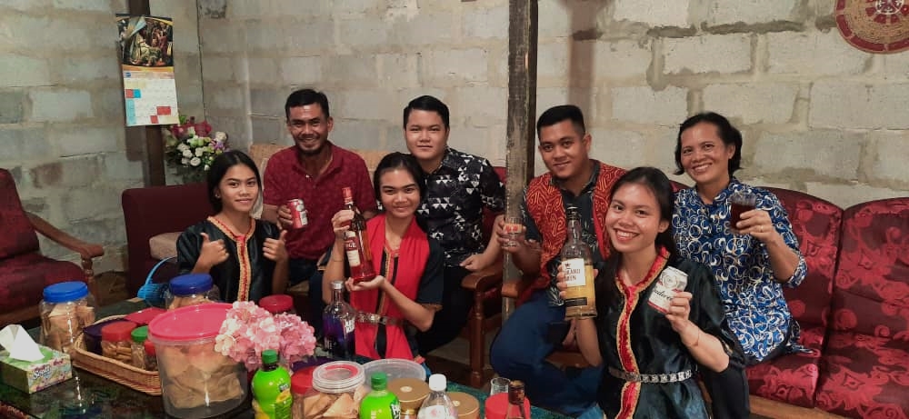 Veronica (far right, sitting on the floor) celebrates Gawai this year with her family. Last year during Gawai, SOP restrictions and fear of police drones, caused her family to celebrate Gawai modestly. – Pic courtesy of Marilyn Madrod