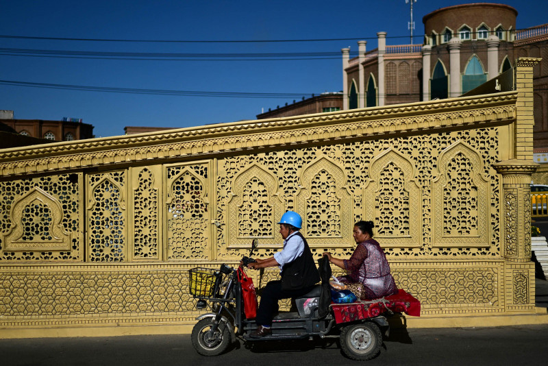 State-backed tourism booms in China’s troubled Xinjiang