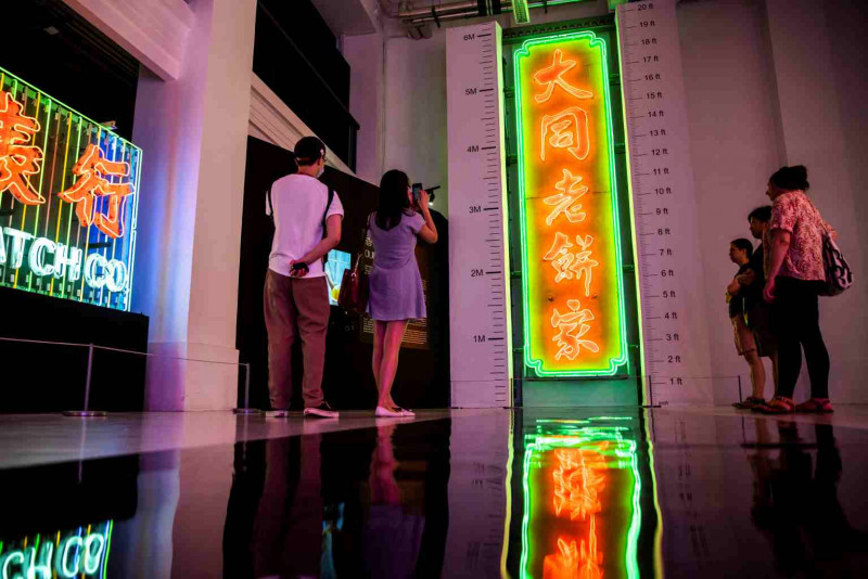 Fading neon signs shine again in Hong Kong exhibit