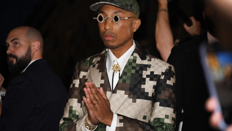 Pharrell brings gospel party to Paris with fashion debut