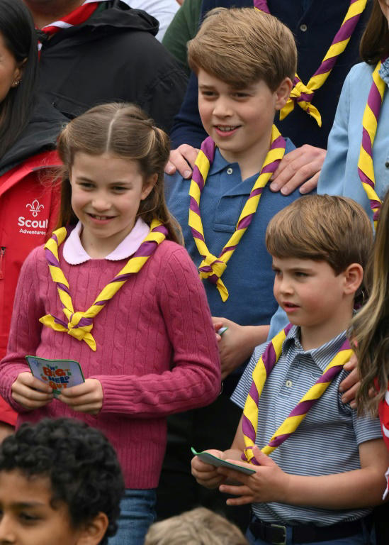 Prince George (centre), Princess Charlotte and Prince Louis helped renovate a scout hut. – AFP pic