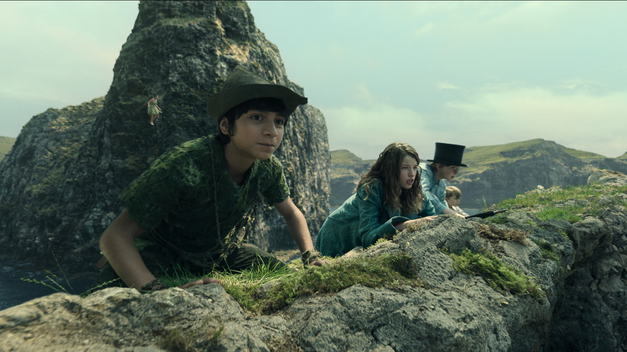 Peter Pan, played by Alexander Molony, taking Wendy and her brothers to Neverland. – Disney pic