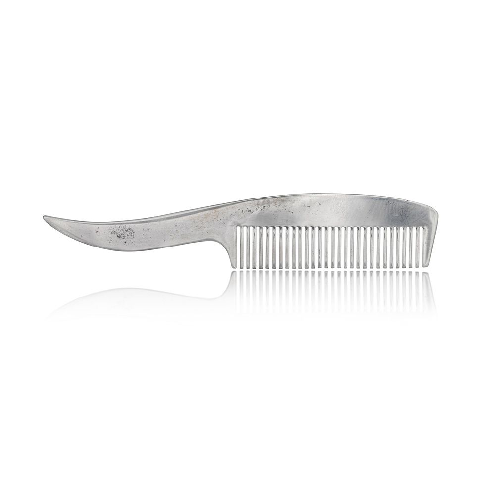 A Tiffany & Co silver moustache comb that would have fitted inside Mercury's wallet. Estimate £400–£600. – Sotheby's pic