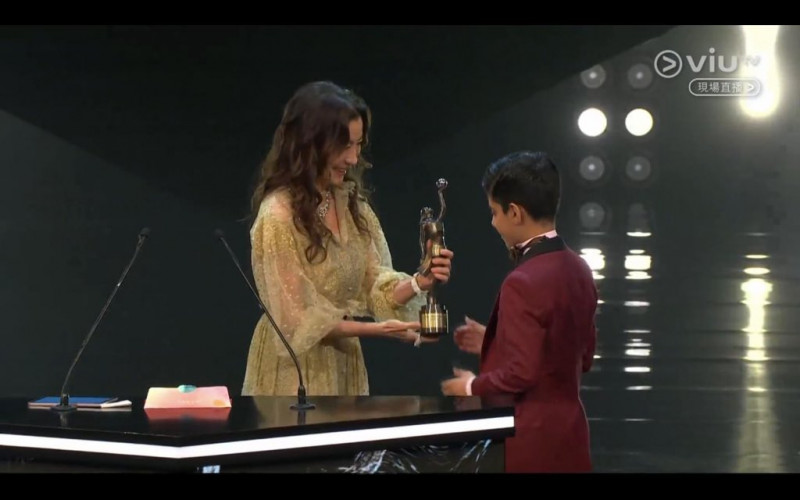 Michelle Yeoh presents Best New Performer Award to Sahal Zaman at Hong Kong Film Awards