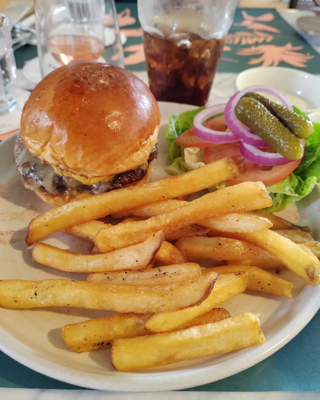The cheeseburger with a side of crisp potato fries. – Haikal Fernandez pic