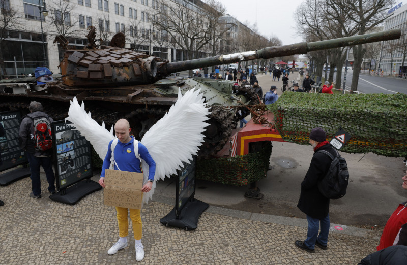 Tank wreck, protests mark war anniversary in Europe