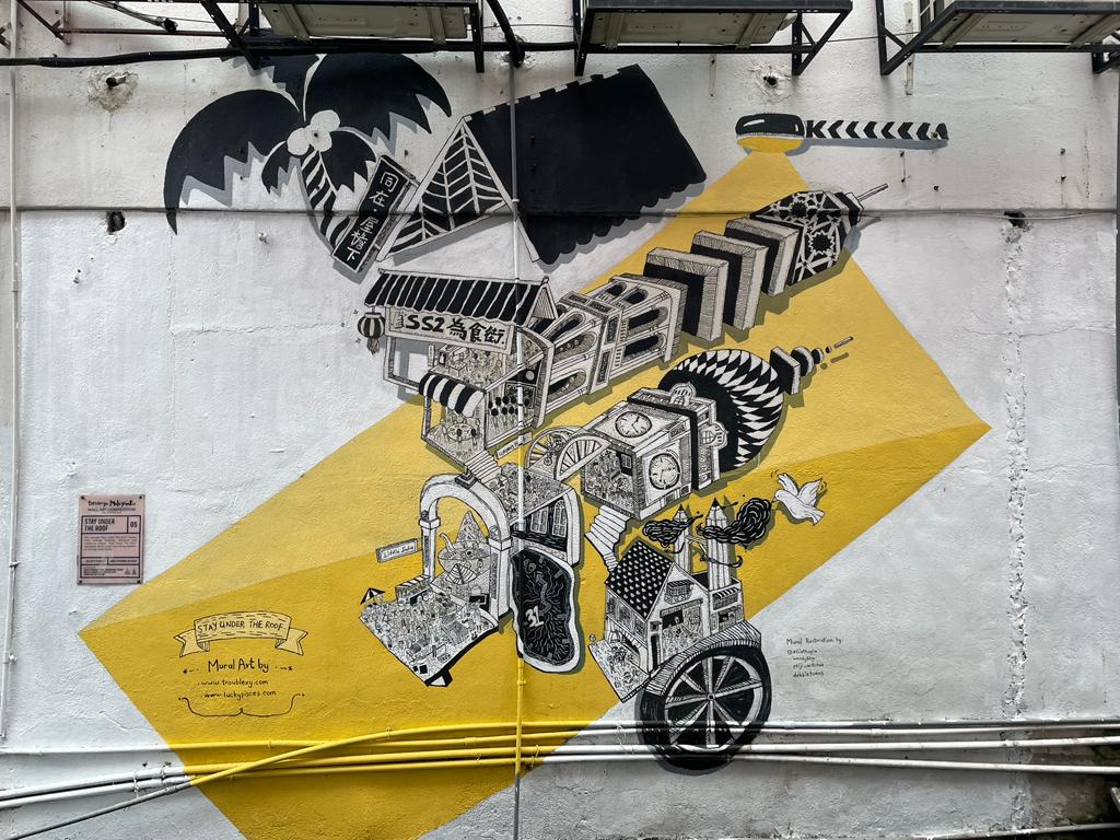 (Above and below) A mural in Jalan SS 2/67 before and after the restoration. – Pic courtesy of ADN Kampung Tunku