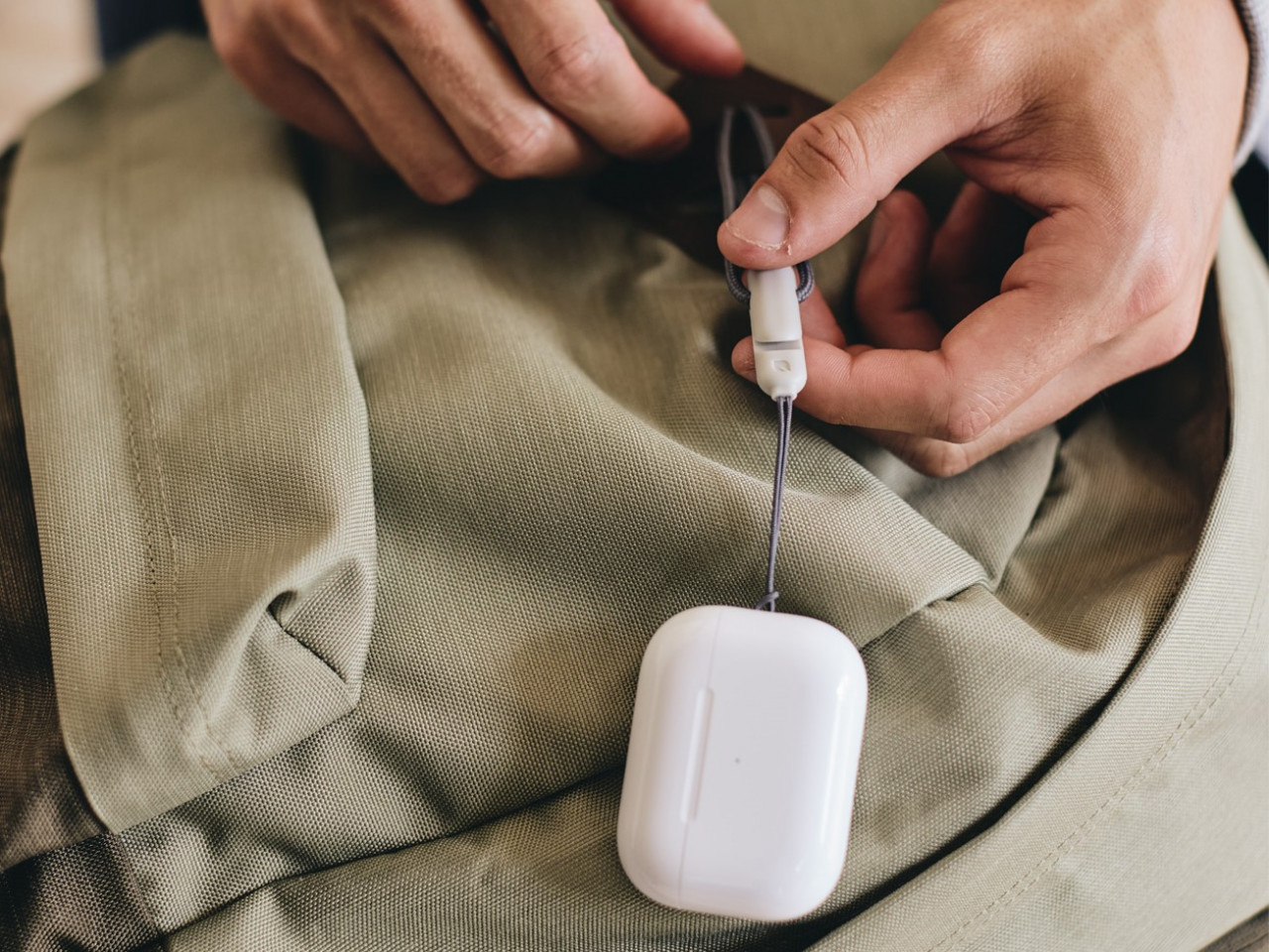 While the case is the same size and shape as the previous generation, you can now attach a lanyard to keep your AirPods somewhere close. – Pic courtesy of Apple