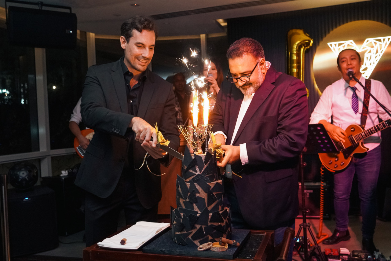 PETRA Group’s Chairman and Chief Executive Datuk (Dr) Vinod Sekhar (right) and Guiati during V's Bar's first-anniversary celebration last night. – PETRA Group pic