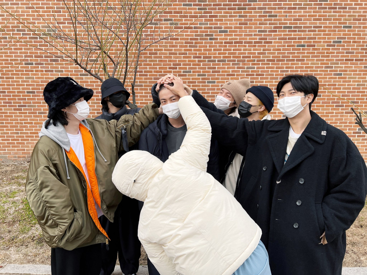 Members of BTS during Jin's sending-off. – Twitter pic