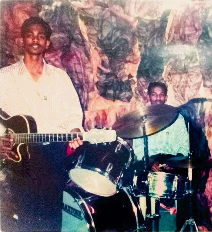 Pannir Selvam (right) playing the drum in his church in Ipoh. His favourite Christmas carol is ‘The little drummer boy’ and because of this he earned the moniker ‘The little drummer boy’. – Pic courtesy of Pranthaman family album