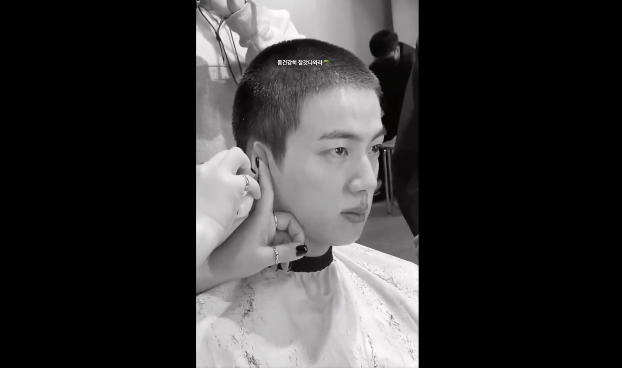 A video of Jin getting his haircut made the rounds on social media. – Twitter screen grab