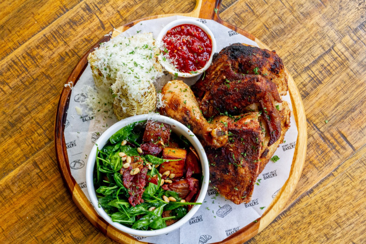 The Wood-fired Spring Chicken is an all around meal with a salad and corn on the cob to round out the dish. – Pic courtesy of Kenny Hills Bakery