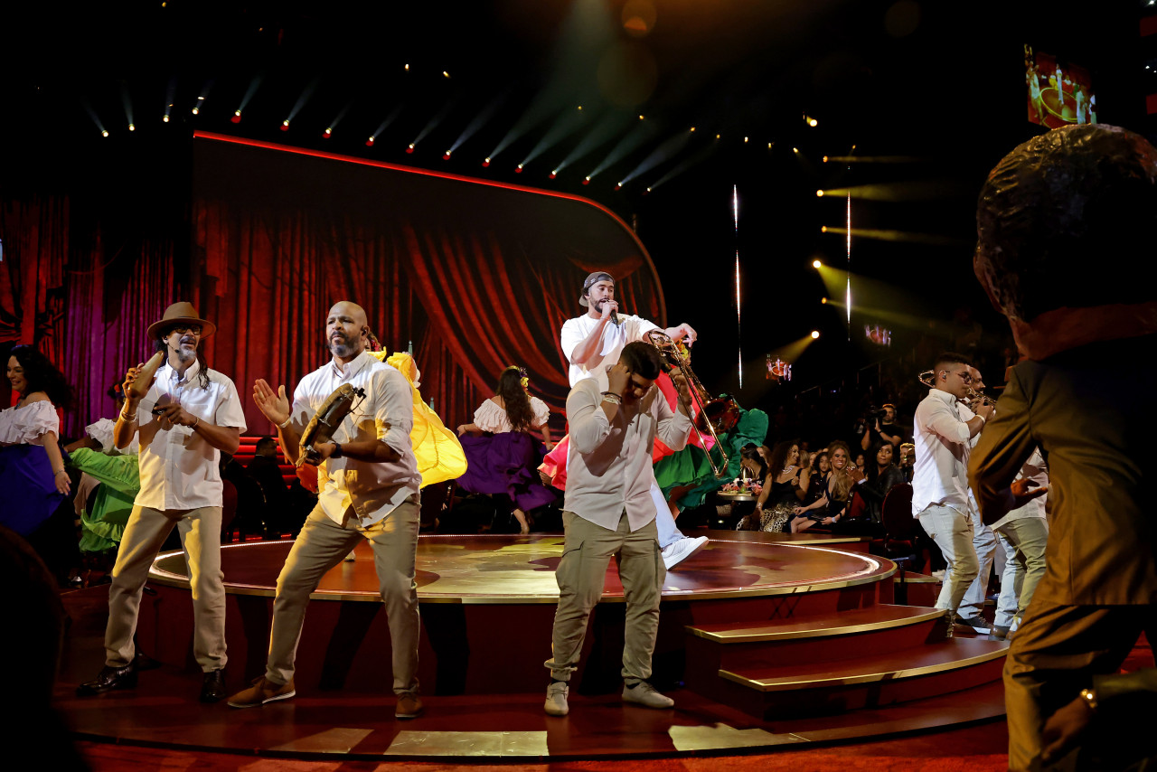 Bad Bunny (centre) performing onstage during the 65th Grammy Awards at Crypto.com Arena. – AFP pic