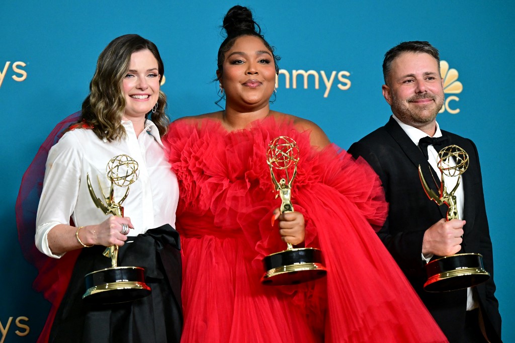 (From left) Alana Balden, US singer-songwriter Lizzo and producer Kevin Beisler with the Emmy for Outstanding Competition Program for 'Lizzo's Watch Out For the Big Grrrls'. – AFP pic