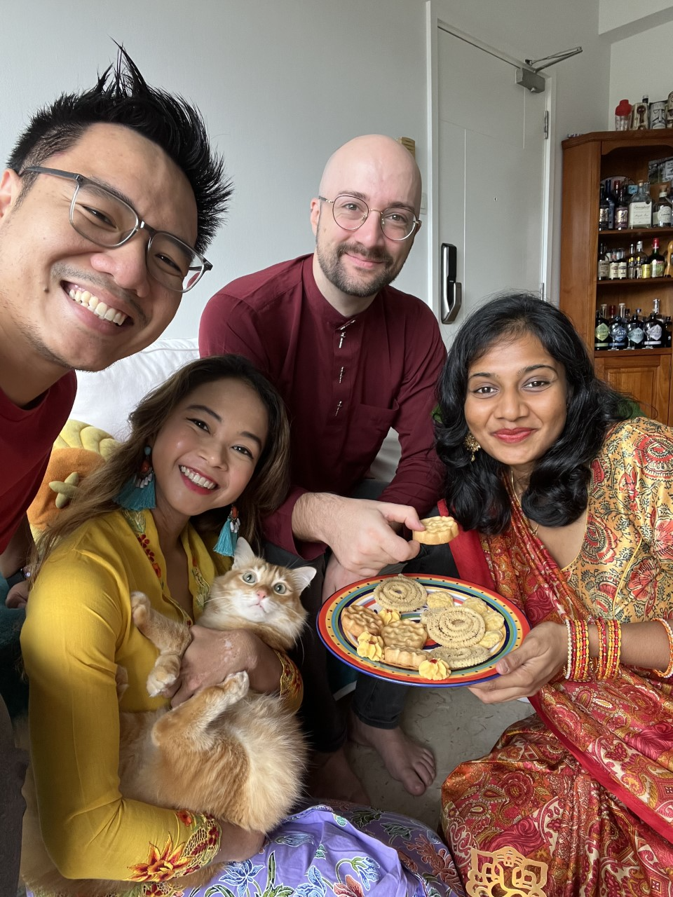 Meliza and her friends pose with their sweets and cookies. – Pic courtesy of Melizarani T. Selva