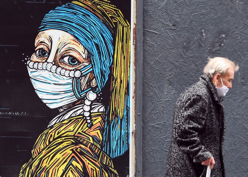 After a year of the pandemic, an exhibition traces mask-wearing