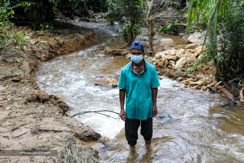 ‘New river’ needs burying, resident says after Gunung Jerai floods