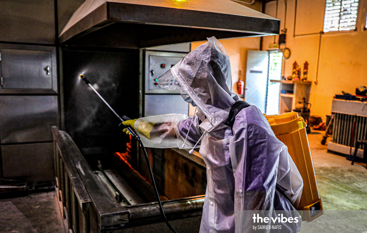 A health worker disinfects a cremator after use at the Nirvana Memorial Park. – The Vibes pic, February 4, 2021