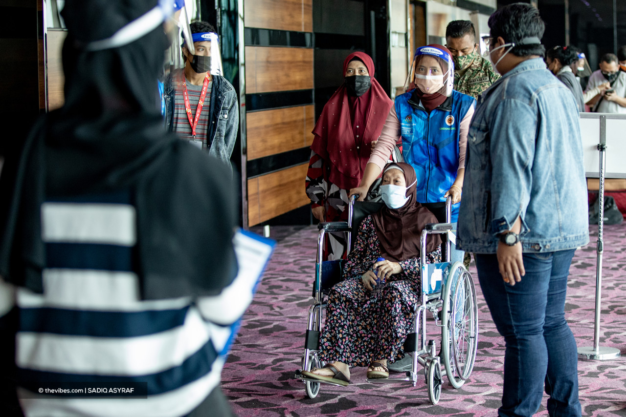A total of 3,025,275 senior citizens have registered for vaccination, with at least the first dose administered to 2,680,880, or 88.61%, says the prime minister. – SADIQ ASYRAF/The Vibes pic, July 17, 2021