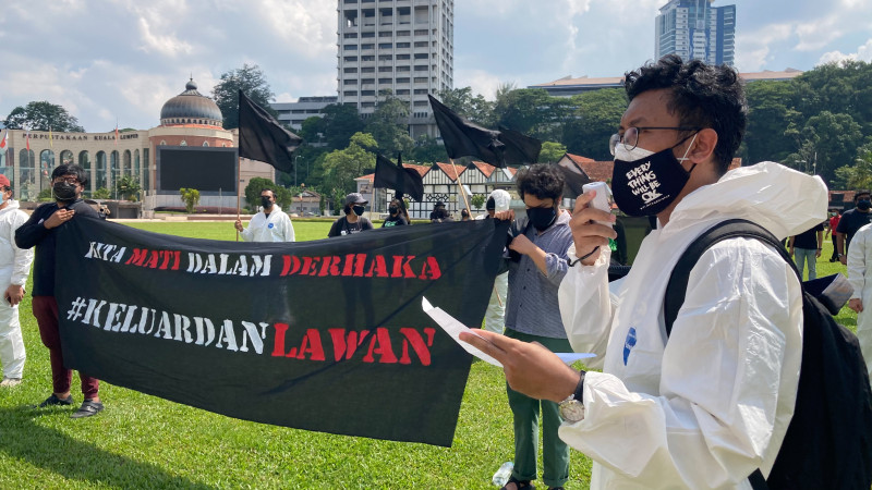 Black flags fly at Dataran Merdeka in Sekretariat Solidariti Rakyat-led protest