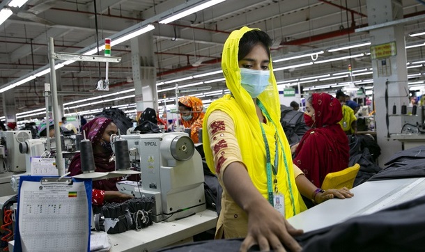 Bangladeshis rush back to work as garment factories reopen despite virus surge