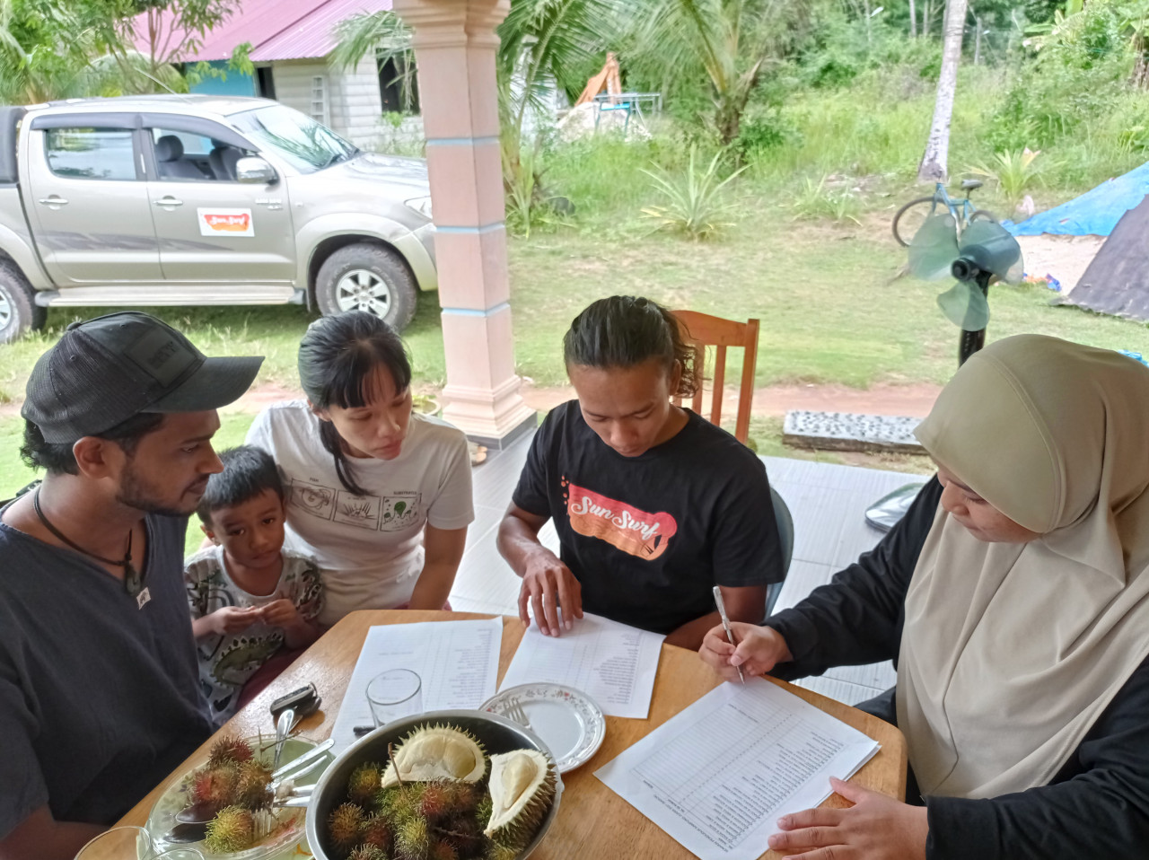 Alvin and his family take part in a breakfast discussion with locals. - Pic courtesy of TMCG