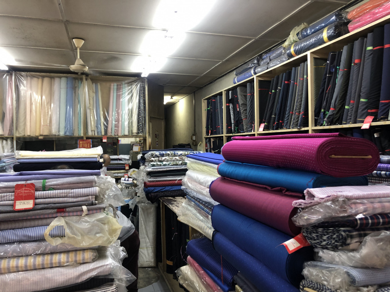 Fabrics of every stripe (and without stripes) are available at Ban Wah textiles. – Pic by Tai Xuan