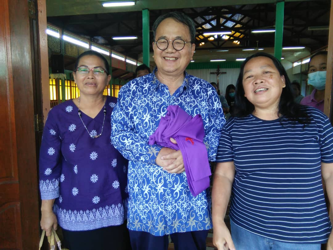 Fr Sylvesterding with two of his former parishioners from when he was an active parish priest. - Pic courtesy of Fr Sylvesterding